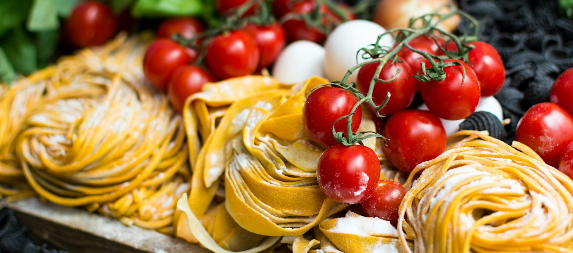 yellow pasta and cherry tomatoes