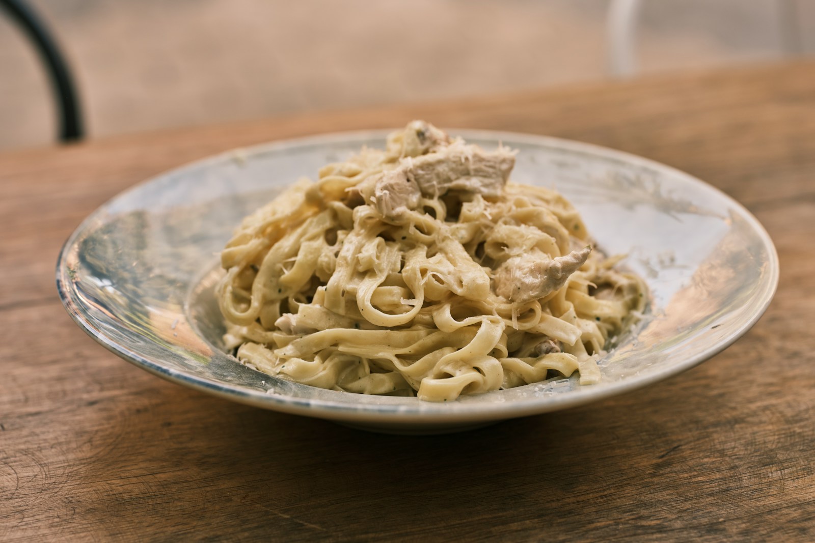 a plate of food on a wooden table